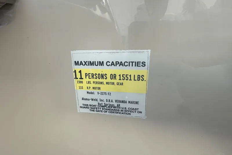 Slide: The Image of 2014 Veranda Fishing V2075-F2 capacity label, 11 persons or 1551 lbs, 115 HP motor. - 35