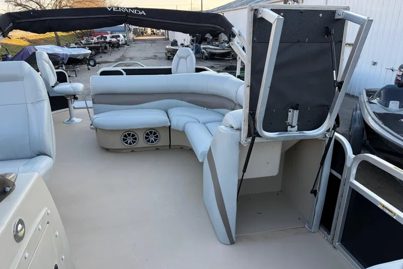 Slide: The Image of 2014 Veranda Fishing V2075-F2 pontoon boat interior with seating and storage area. - 38