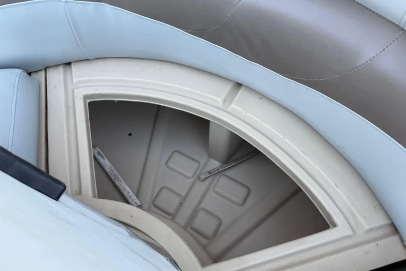 Slide: The Image of 2014 Veranda Fishing V2075-F2 boat seat storage compartment, featuring light blue upholstery. - 50