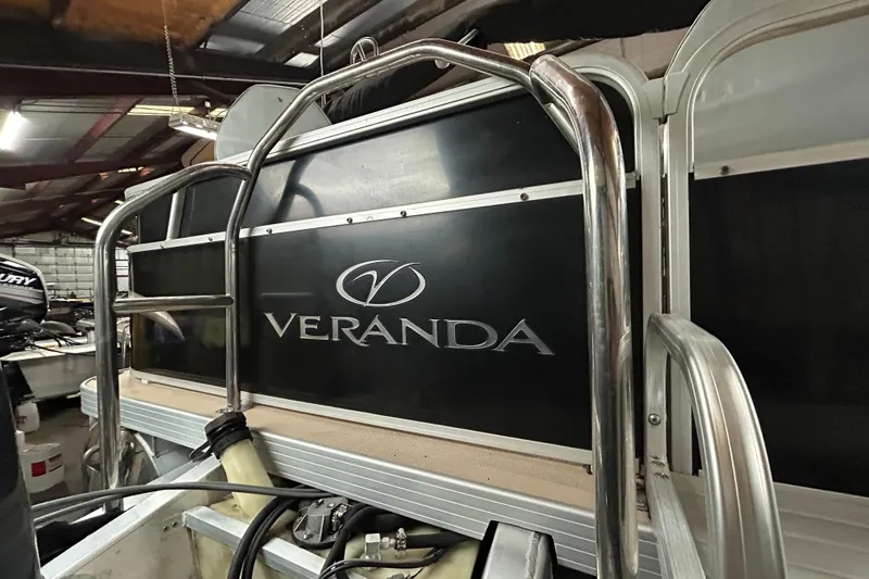 Slide: The Image of 2014 Veranda Fishing V2075-F2 boat, close-up of logo and sleek design. - 6