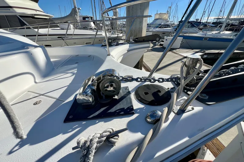 Slide: The Image of 1998 Baha Cruisers 340 CAT boat deck with anchor chain and winch. - 19