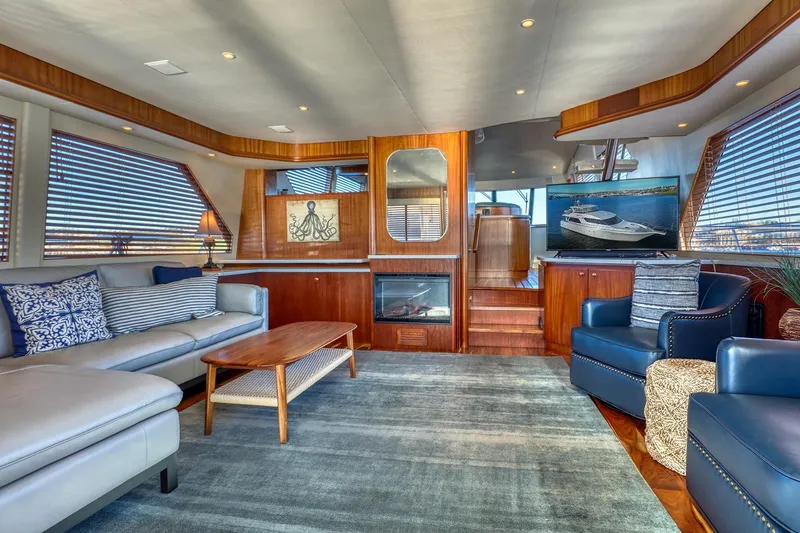 Slide: The Image of Luxurious interior of 2004 West Bay SonShip 72 Motoryacht with elegant seating and modern decor. - 12