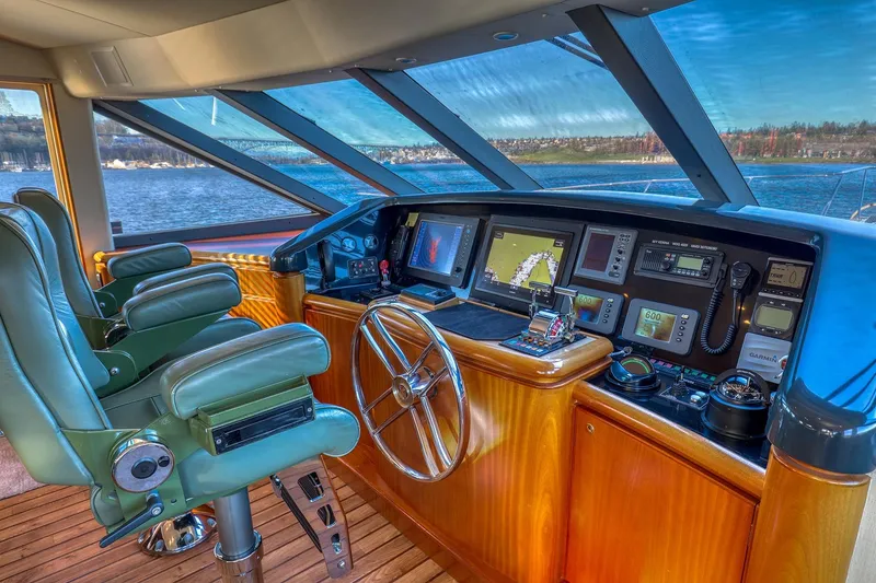 Slide: The Image of Luxurious helm of 2004 West Bay SonShip 72 Motoryacht with advanced navigation systems. - 16