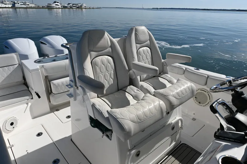 Slide: The Image of 2020 Sea Fox 288 Commander boat interior with luxurious seating and dual engines. - 10