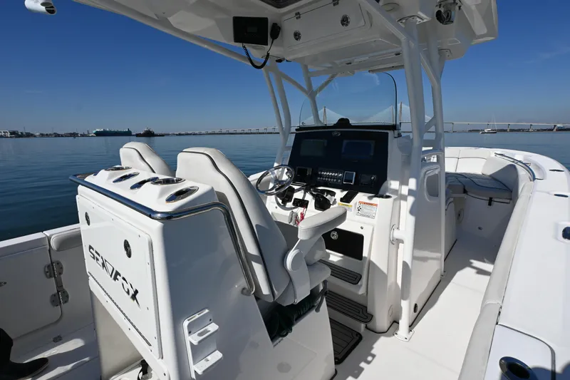 Slide: The Image of 2020 Sea Fox 288 Commander boat interior with helm, seats, and ocean view. - 6