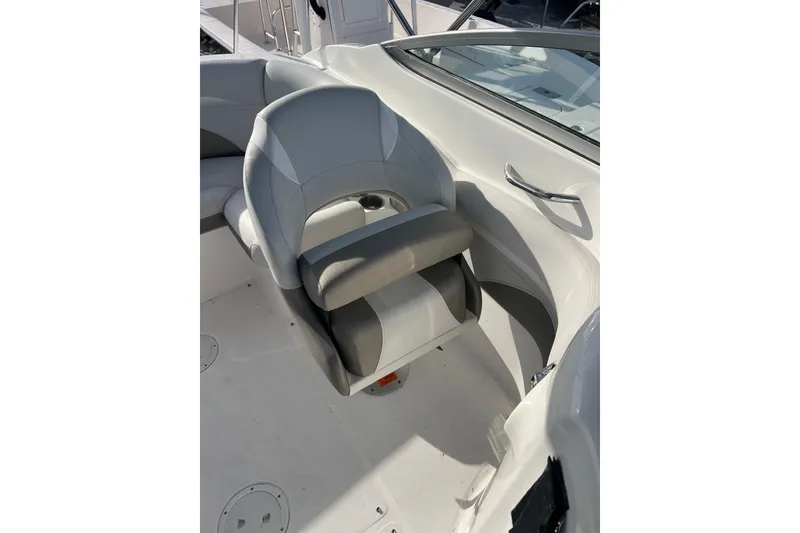 Slide: The Image of Captain's seat on 2017 Hurricane SunDeck 2200 DC OB boat, featuring sleek design and comfort. - 7