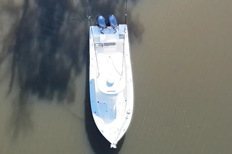 Slide: The Image of Overhead view of 2019 Sea Hunt Gamefish 25 boat on calm water. - 18