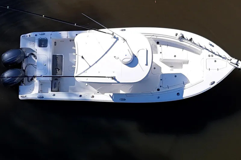 Slide: The Image of Overhead view of 2019 Sea Hunt Gamefish 25 boat with dual engines. - 19