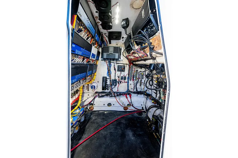 Slide: The Image of Electrical wiring and components inside a 2002 Yellowfin 36 Offshore boat. - 23