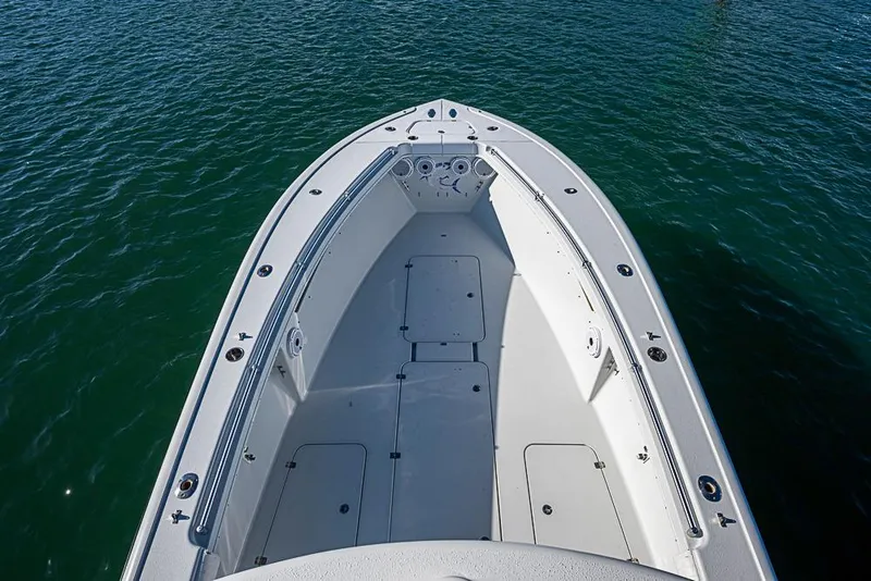 Slide: The Image of 2002 Yellowfin 36 Offshore boat deck on calm water. - 5