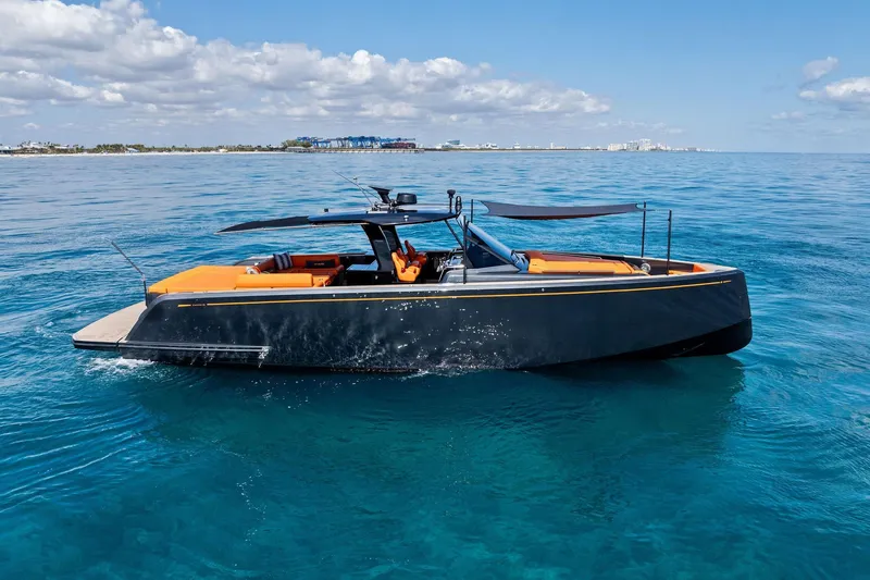 Slide: The Image of Luxury 2023 Pardo Yachts 50 cruising on clear blue ocean waters. - 12