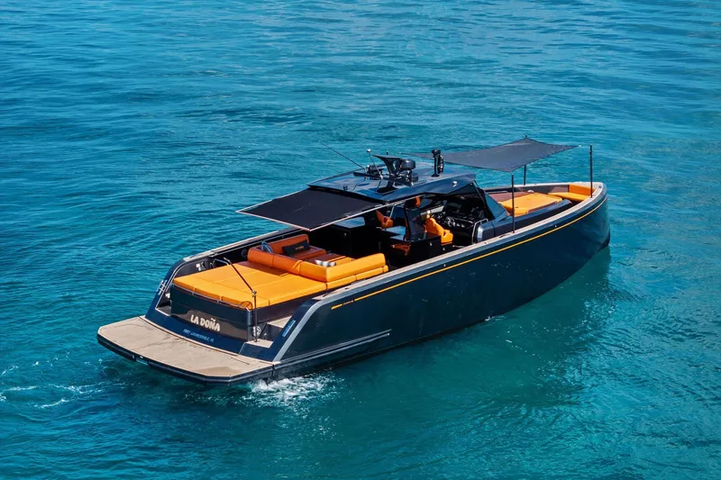 Slide: The Image of 2023 Pardo Yachts 50 on turquoise water, featuring sleek design and sunshade. - 14