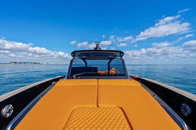 Slide: The Image of 2023 Pardo Yachts 50 helm with advanced controls and navigation display. - 23