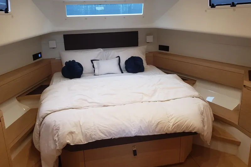 Slide: The Image of 2023 Pardo Yachts 50 cruising on clear blue ocean under a sunny sky. - 3