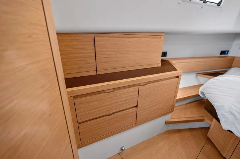 Slide: The Image of Luxurious 2023 Pardo Yachts 50 interior with wooden cabinetry and modern amenities. - 39