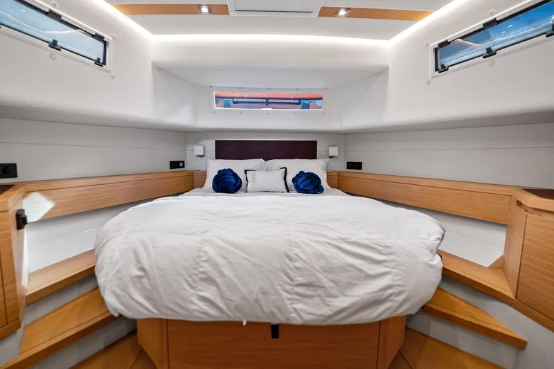 Slide: The Image of Luxurious cabin interior of 2023 Pardo Yachts 50, featuring a cozy bed and modern design. - 40