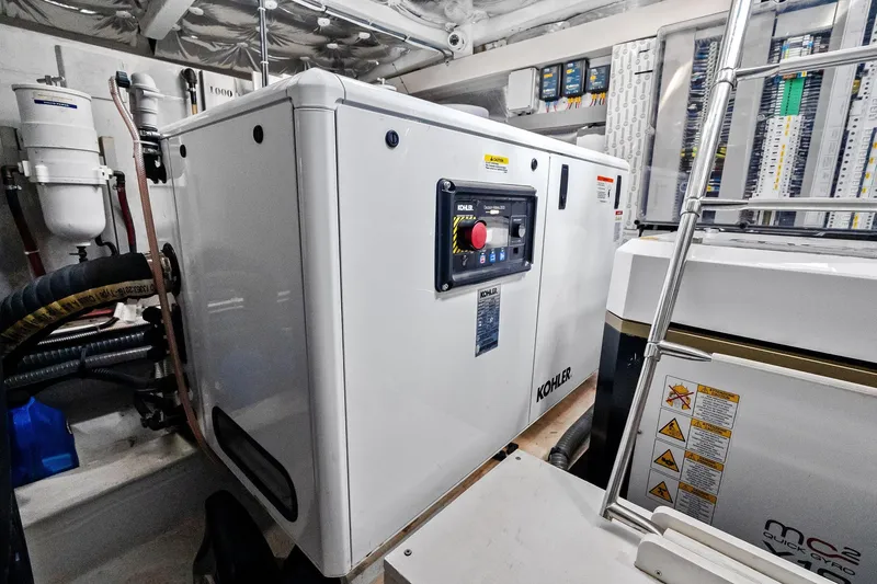 Slide: The Image of Engine room of 2023 Pardo Yachts 50, showcasing modern marine engine components. - 46