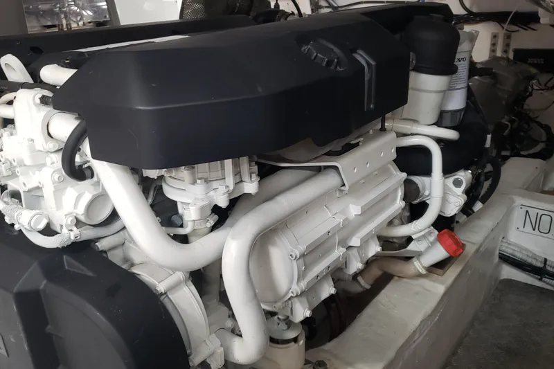 Slide: The Image of 2023 Pardo Yachts 50 cruising on open sea under a clear blue sky. - 6