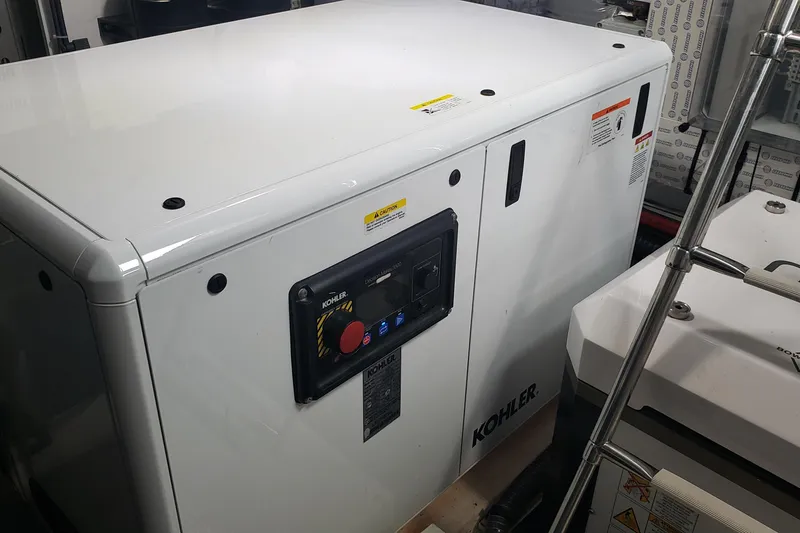 Slide: The Image of 2023 Pardo Yachts 50 cruising on open water under a partly cloudy sky. - 7