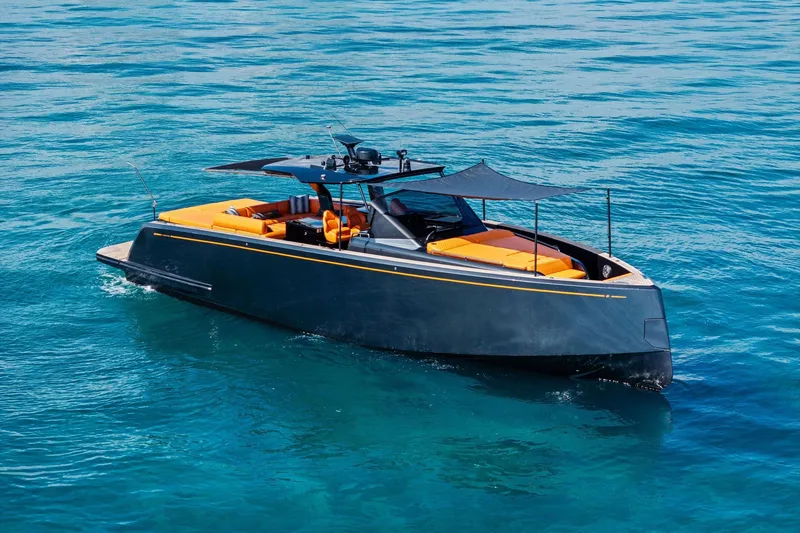 Slide: The Image of 2023 Pardo Yachts 50 with sleek design and vibrant orange seating on blue water. - 15