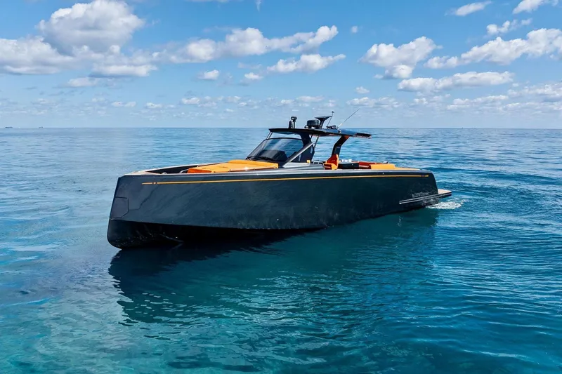 Slide: The Image of 2023 Pardo Yachts 50 on calm sea, featuring luxurious orange seating and sleek design. - 20