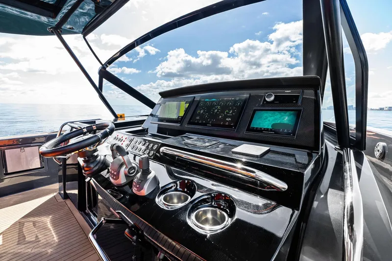 Slide: The Image of Luxurious 2023 Pardo Yachts 50 interior with sleek design and vibrant orange seating. - 25