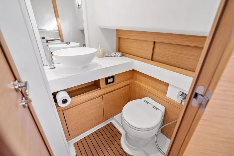 Slide: The Image of Luxurious bathroom in 2023 Pardo Yachts 50, featuring modern fixtures and wooden accents. - 42