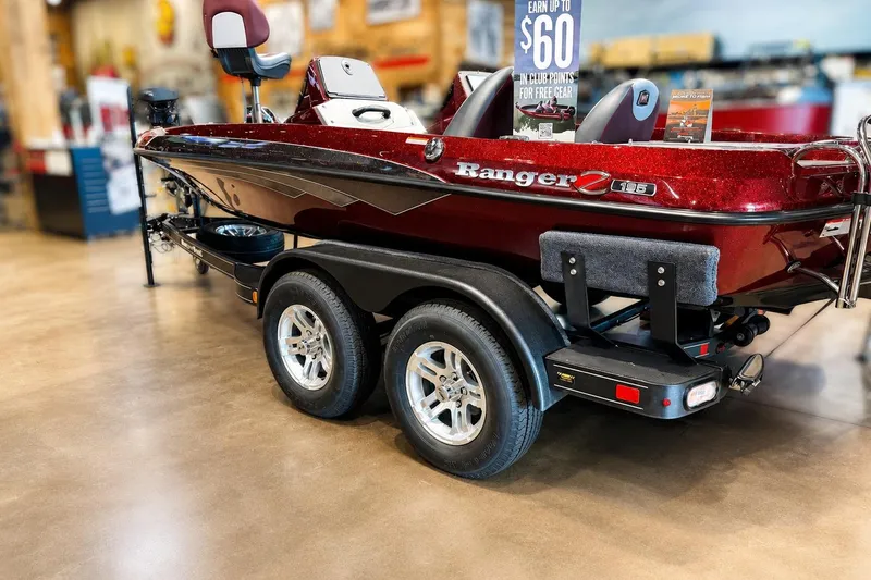 Slide: The Image of 2026 Ranger Z185 boat on display, featuring sleek design and dual-axle trailer. - 0