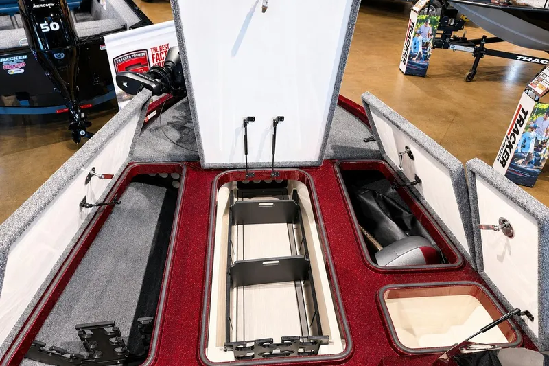 Slide: The Image of Interior view of 2026 Ranger Z185 boat storage compartments, showcasing organized space and design. - 3