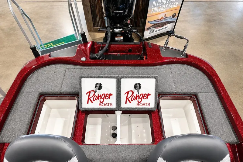 Slide: The Image of 2026 Ranger Z185 boat interior with storage compartments and Ranger Boats logo. - 6