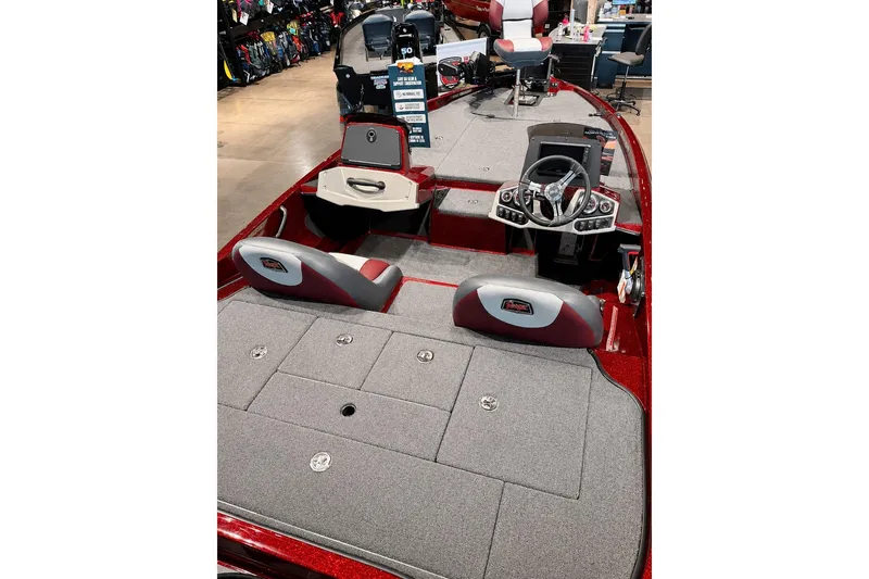 Slide: The Image of 2026 Ranger Z185 boat interior with dual seats, steering console, and spacious deck. - 5