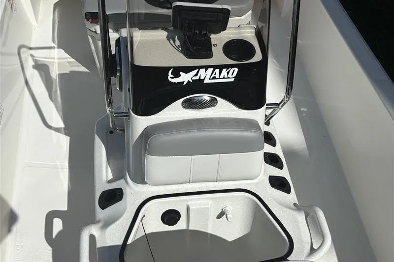 Slide: The Image of 2026 Mako Pro Skiff 15 CC boat interior with console and seating. - 6