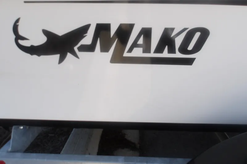 Slide: The Image of Logo of Mako Pro Skiff 17 CC, 2026 model, featuring a shark silhouette. - 14