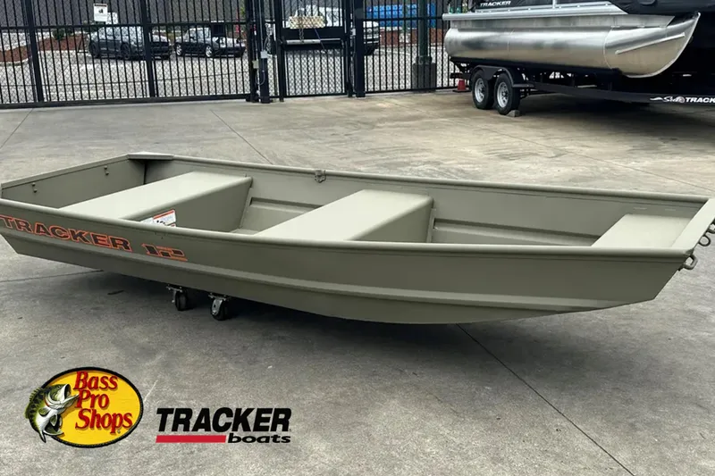 The Image of 2026 Tracker Grizzly 12 Jon boat displayed at Bass Pro Shops dealership. - 0