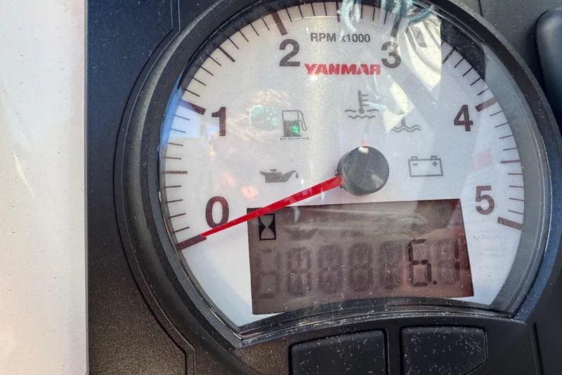 Slide: The Image of Yanmar RPM gauge on 2019 Beneteau Oceanis 41.1 sailboat, displaying 6.9 hours. - 5