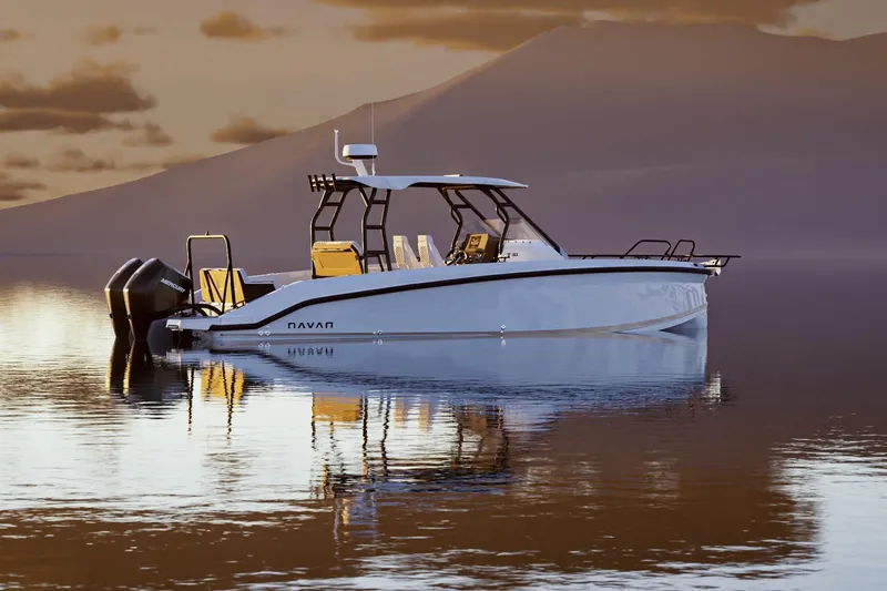 The Image of 2026 Navan T30 boat on calm water at sunset, reflecting serene mountain backdrop. - 0