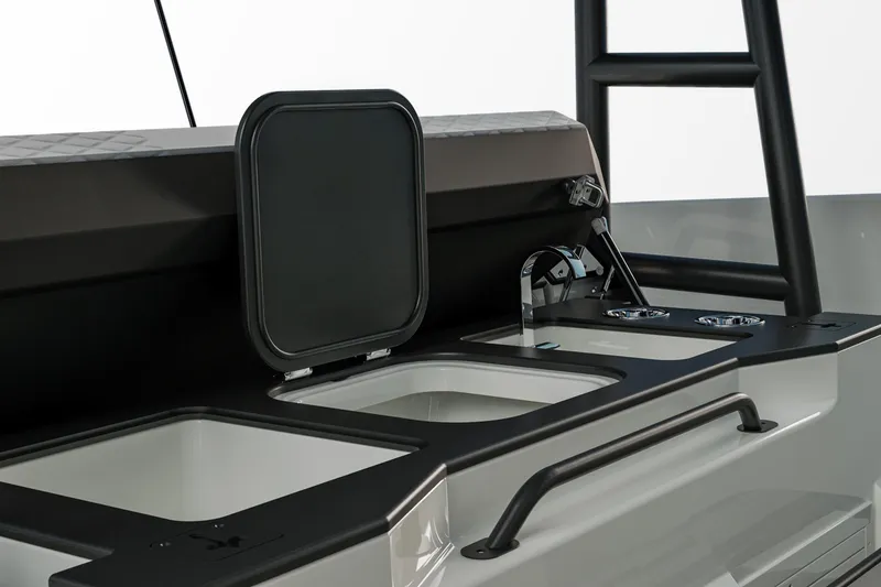 Slide: The Image of 2026 Navan T30 boat interior with open storage compartments and sleek design. - 12