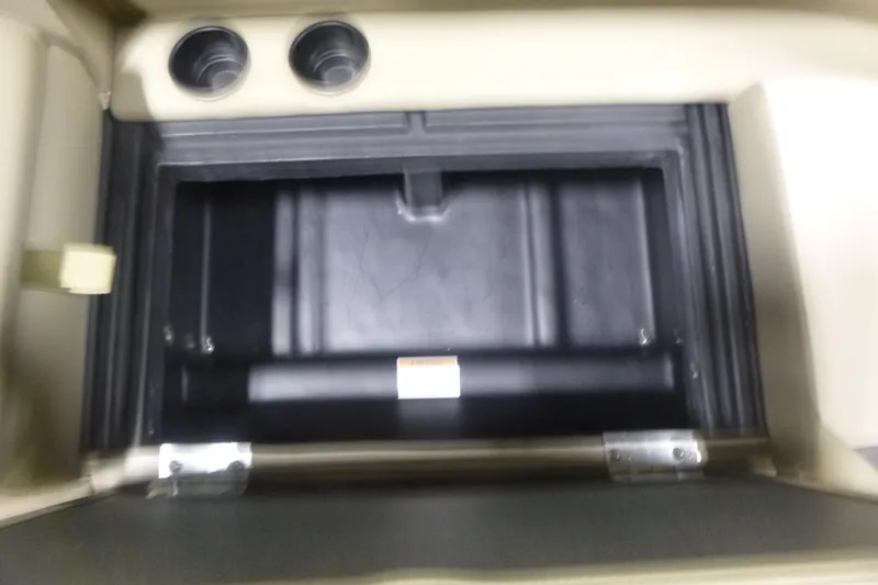 Slide: The Image of Storage compartment in 2026 Premier 220 Sunscape RF boat interior. - 11