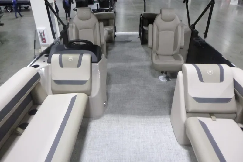 Slide: The Image of 2026 Premier 220 Sunscape RF boat interior with beige seating and modern design. - 5