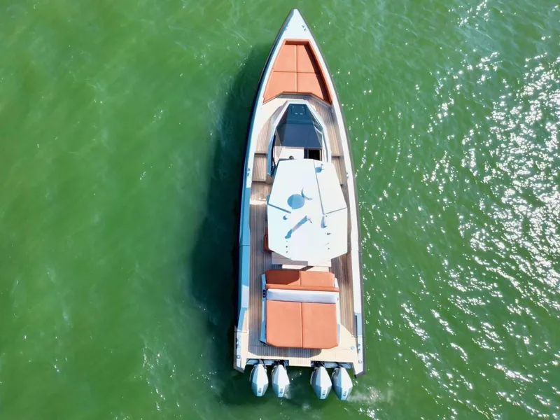Slide: The Image of Aerial view of 2023 Wally 48 X yacht on green water. - 11