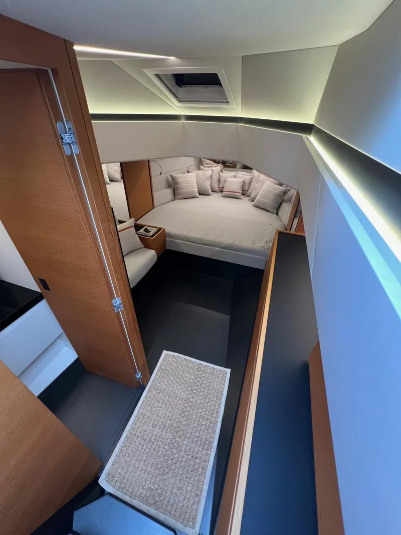 Slide: The Image of Luxurious interior of 2023 Wally 48 X yacht with modern design and cozy sleeping area. - 28