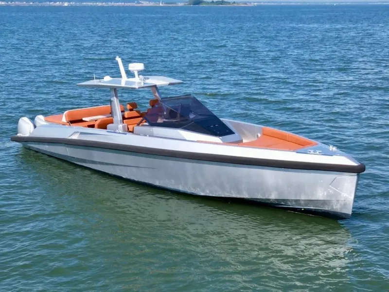 Slide: The Image of 2023 Wally 48 X luxury yacht on calm blue water. - 3
