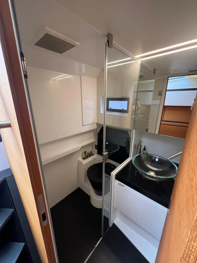 Slide: The Image of Modern bathroom in 2023 Wally 48 X yacht with glass sink and sleek design. - 36