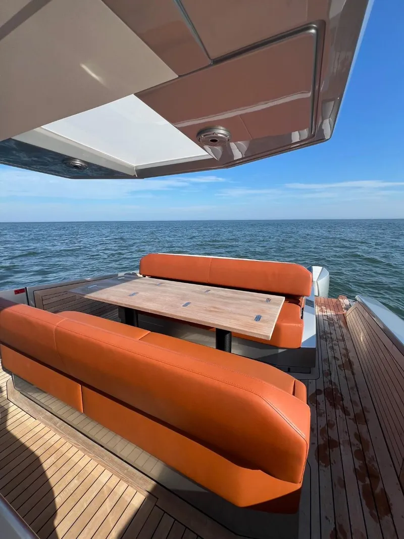 Slide: The Image of Luxurious Wally 48 X boat with orange seating, 2023 model. - 46
