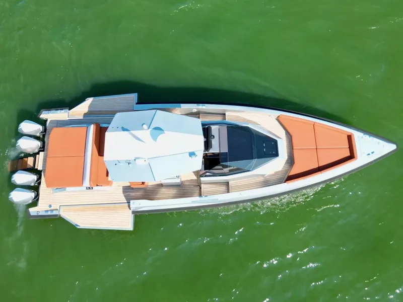 Slide: The Image of Aerial view of 2023 Wally 48 X yacht with sleek design on green water. - 17