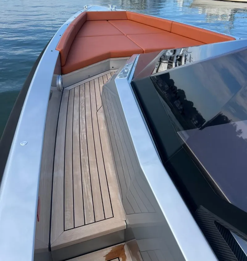 Slide: The Image of 2023 Wally 48 X yacht with sleek deck and orange seating. - 21