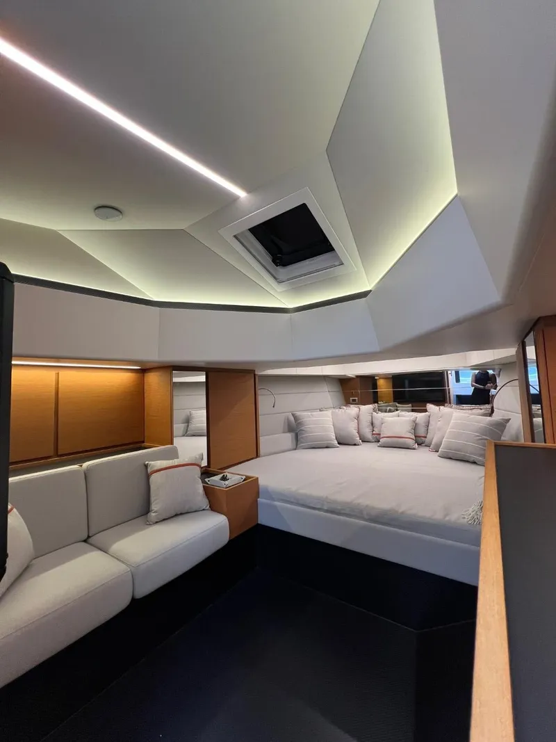 Slide: The Image of Luxurious interior of 2023 Wally 48 X yacht with modern design and cozy seating. - 31