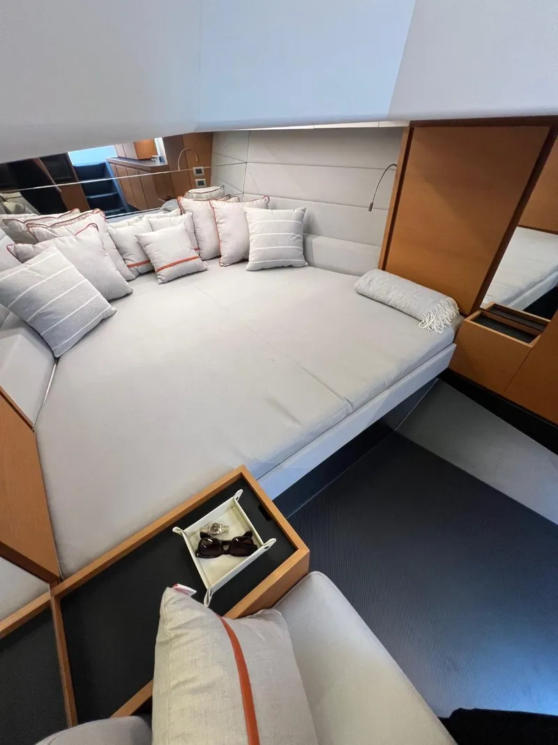 Slide: The Image of Luxurious interior of 2023 Wally 48 X yacht with plush bedding and modern design. - 32
