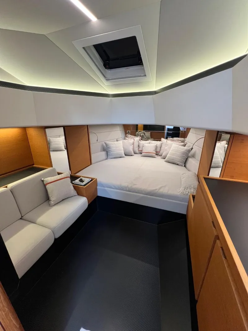 Slide: The Image of Luxurious interior of 2023 Wally 48 X yacht with modern design and cozy seating. - 35