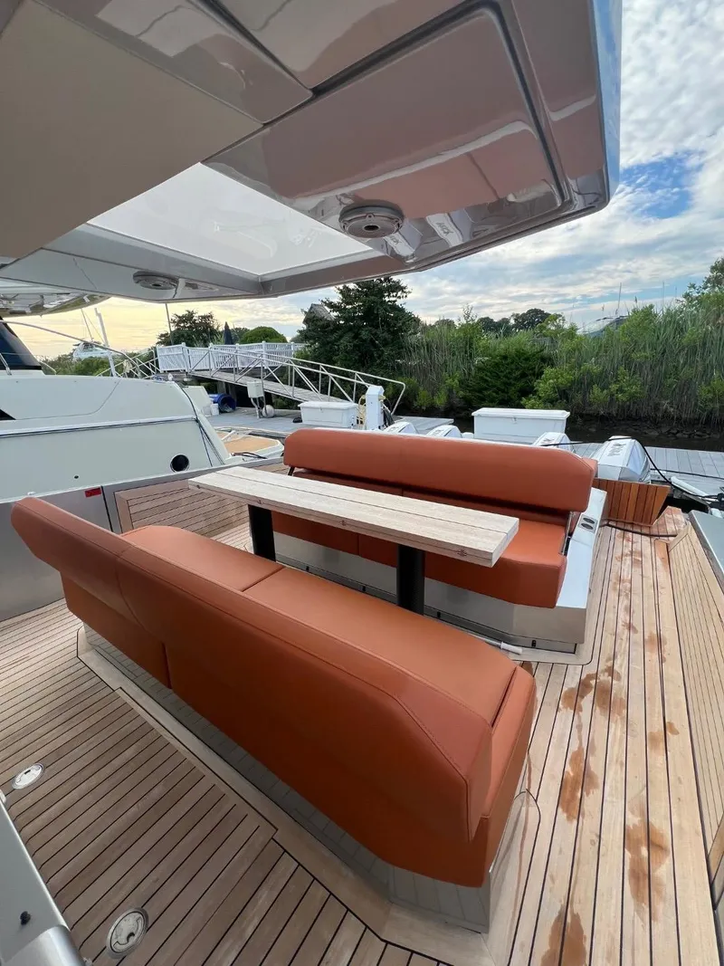 Slide: The Image of Luxury yacht Wally 48 X 2023 with elegant outdoor seating and wooden deck. - 39